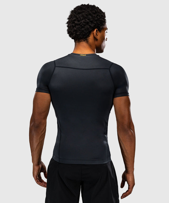 Venum Rashguard Attack Kurzarm - Schwarz/Gold