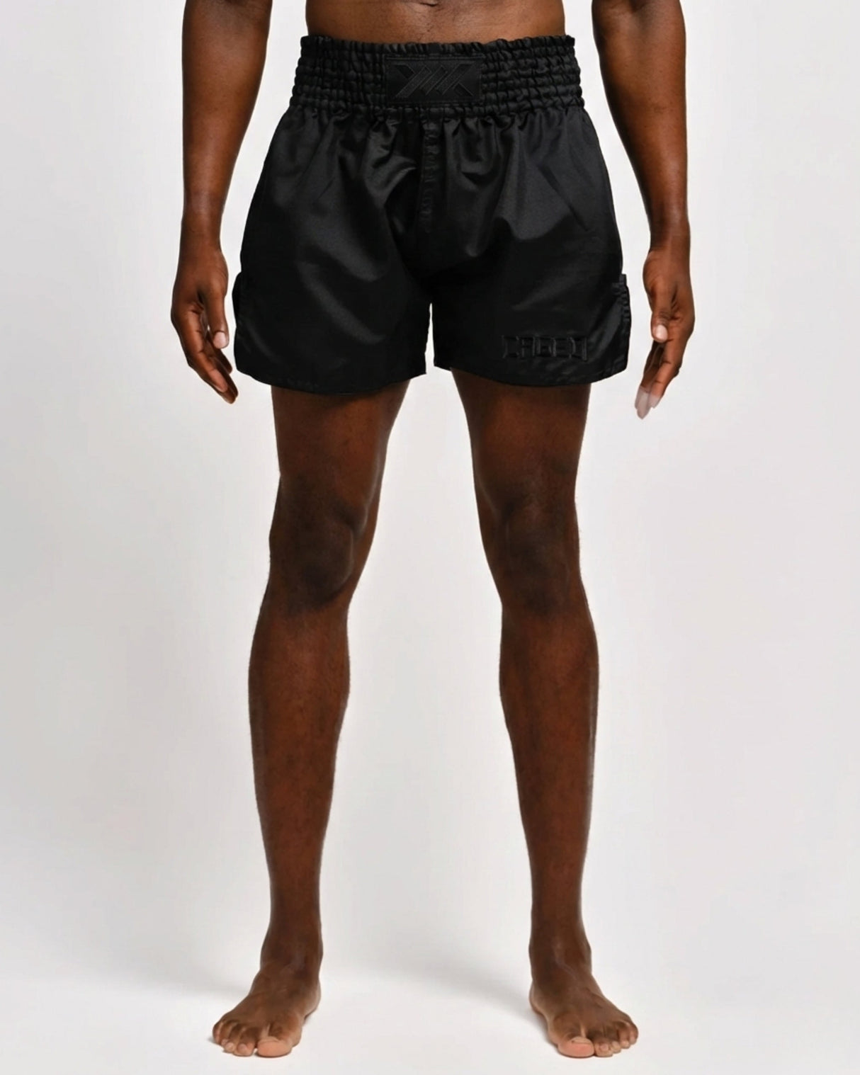 Caged Muay Thai Shorts Classic – Schwarz/Schwarz