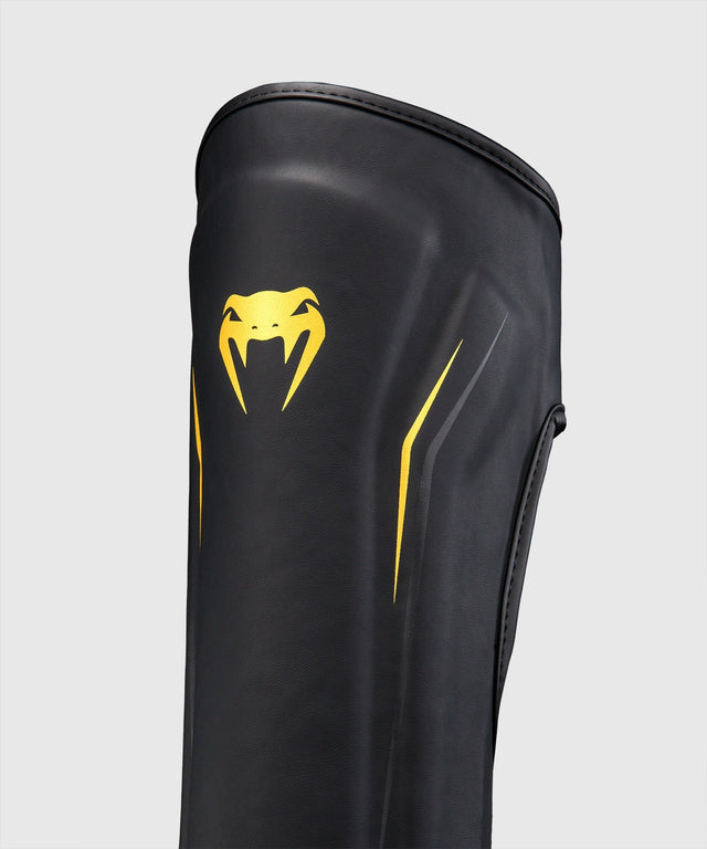 Venum Schienbeinschoner G-Core - Schwarz/Gold
