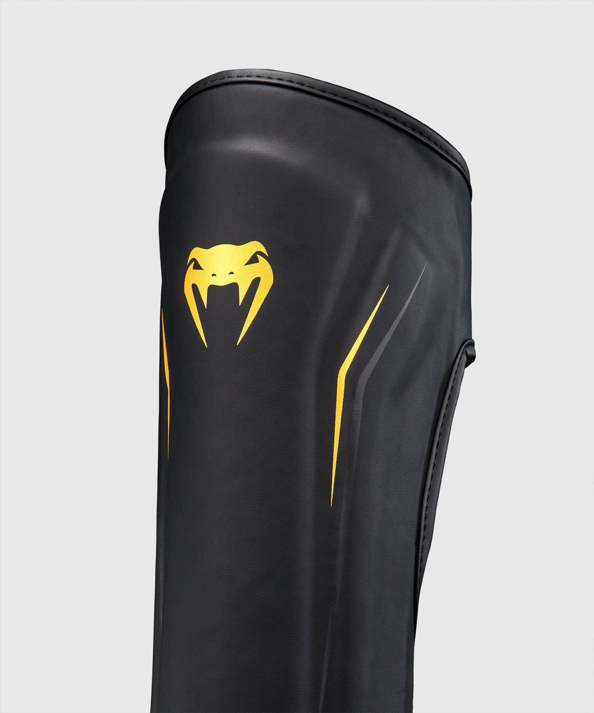 Venum Schienbeinschoner G-Core – Schwarz/Gold