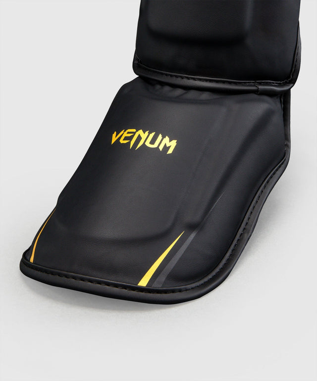 Venum Schienbeinschoner G-Core - Schwarz/Gold