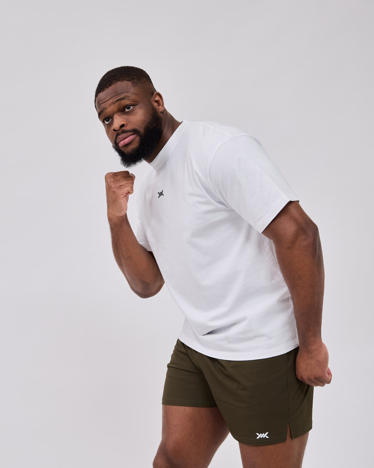 Caged Training Shorts Essential - Armee Grün