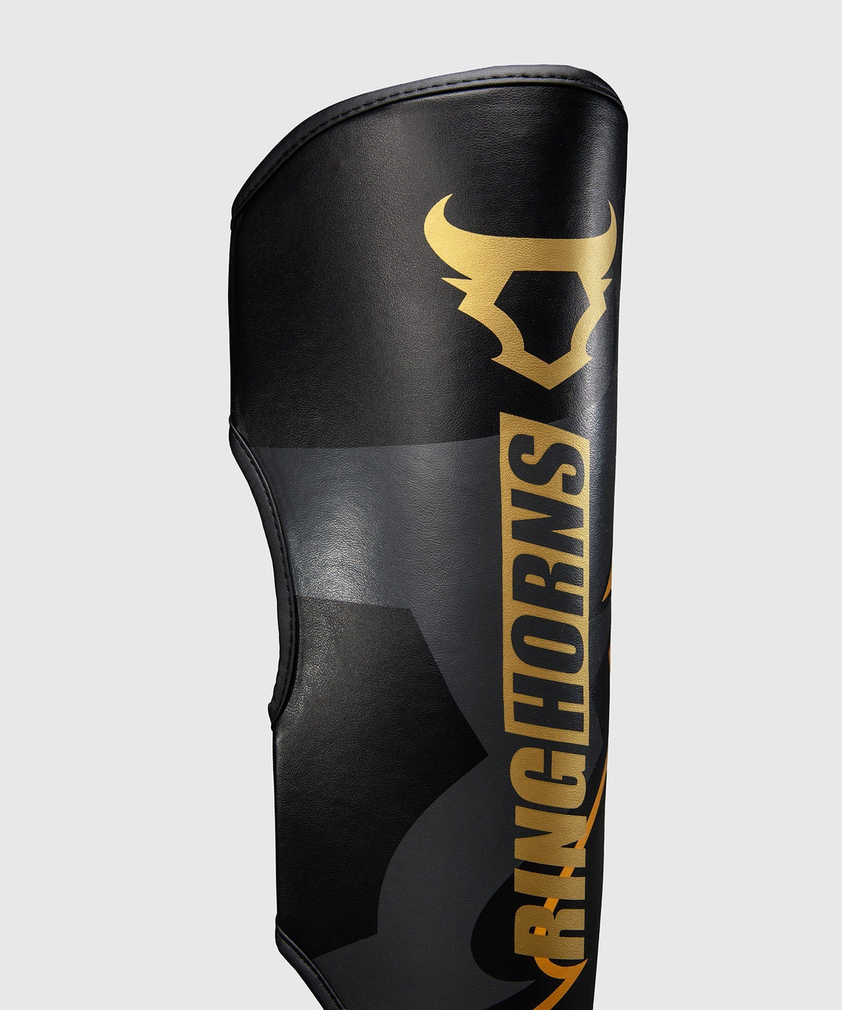 Ringhorns Schienbeinschoner Charger - Schwarz/Gold
