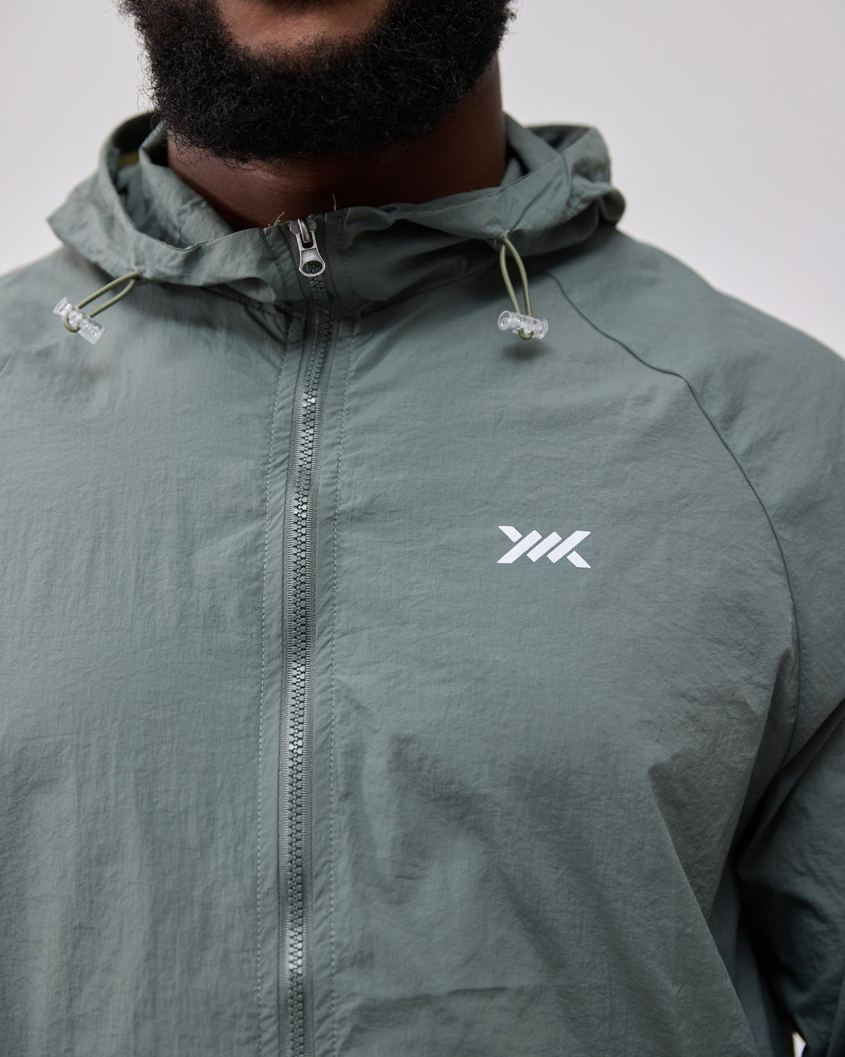 Caged Hooded Ultralight Windbreaker - Minze