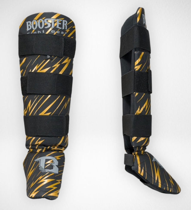 Booster Schienbeinschoner Kids Combat – Schwarz/Gelb