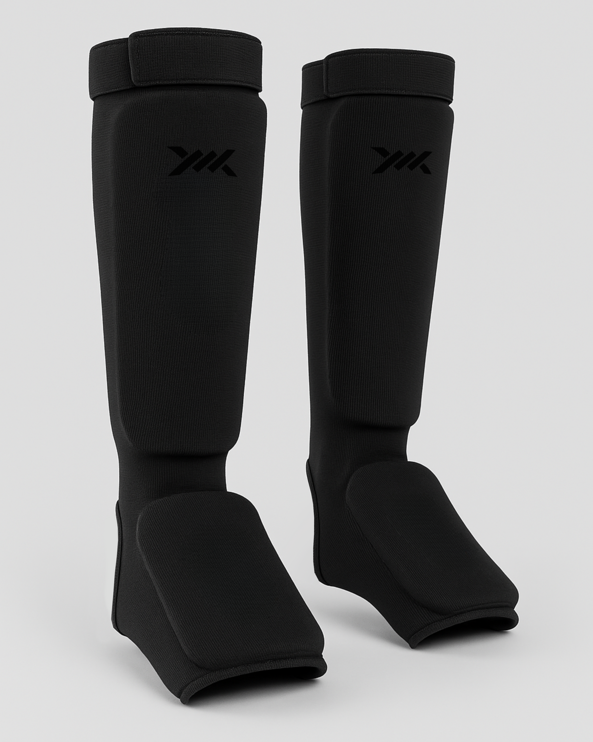 Caged Schienbeinschoner Core – Schwarz/Schwarz