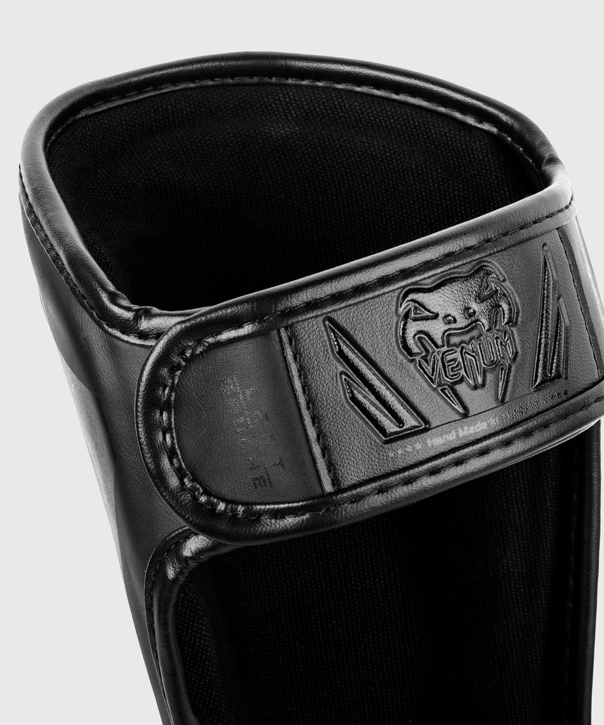 Venum Schienbeinschoner Elite Kinder – Schwarz