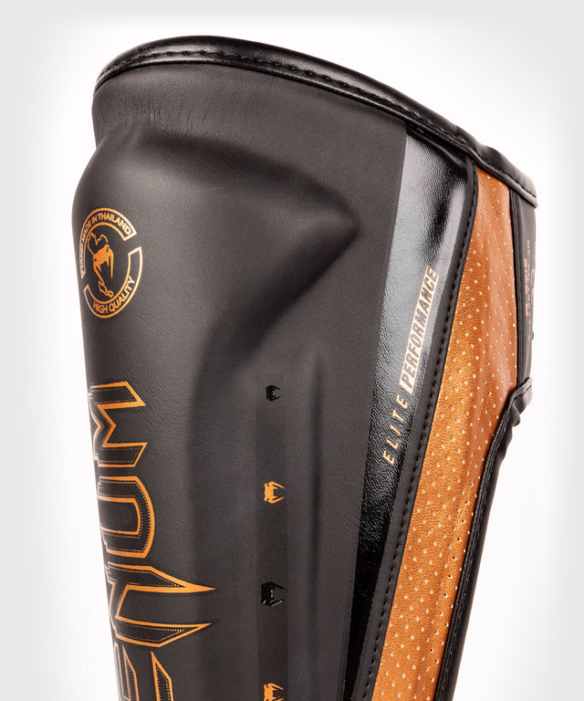 Venum Schienbeinschoner Elite Evo - Schwarz/Bronze