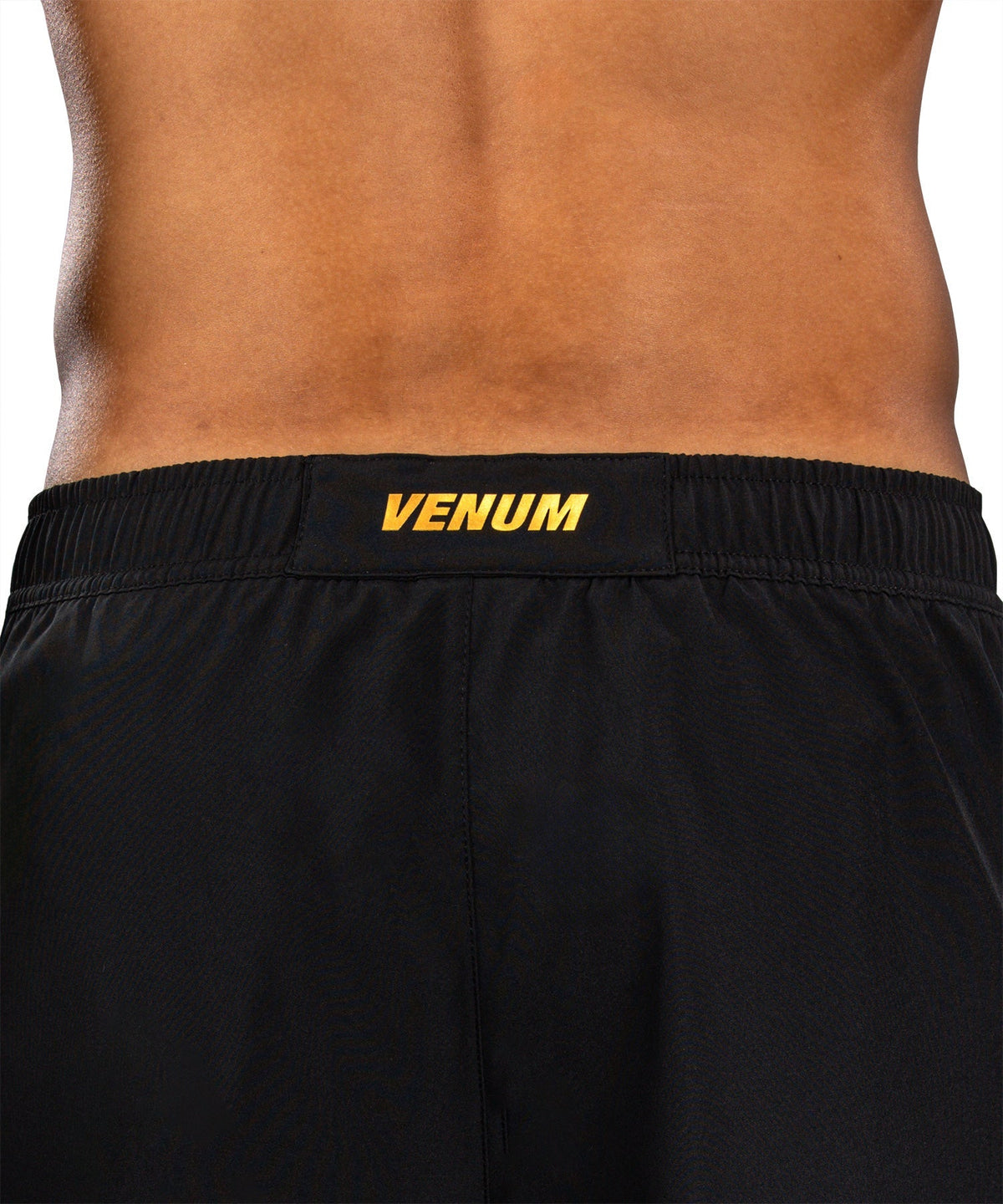 Venum Trainingsshorts G-Core – Schwarz/Gold