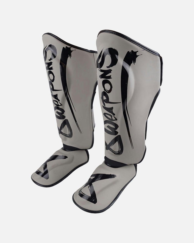 8 WEAPONS Schienbeinschoner Unlimited 2.0 - Sand/Schwarz