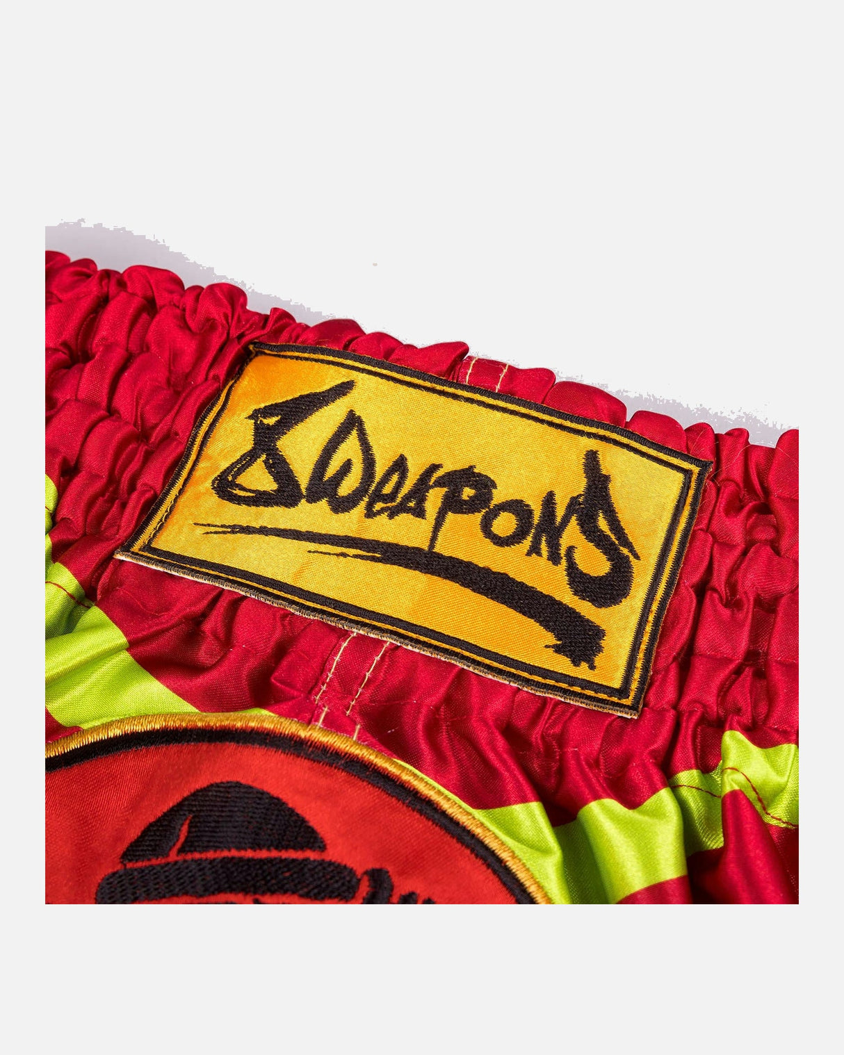 8 WEAPONS Muay-Thai-Shorts Jurassic - Neon Grün/Blutrot
