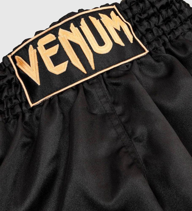 Venum Muay Thai Shorts Classic - Schwarz/Gold - The Fight Company Deutschland