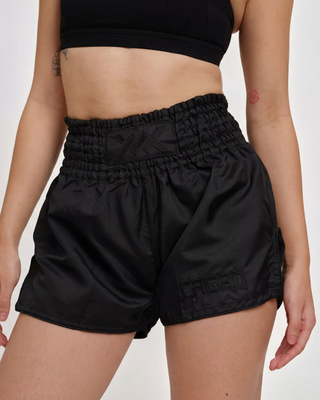 Caged Muay Thai Shorts Classic – Schwarz/Schwarz vrouw