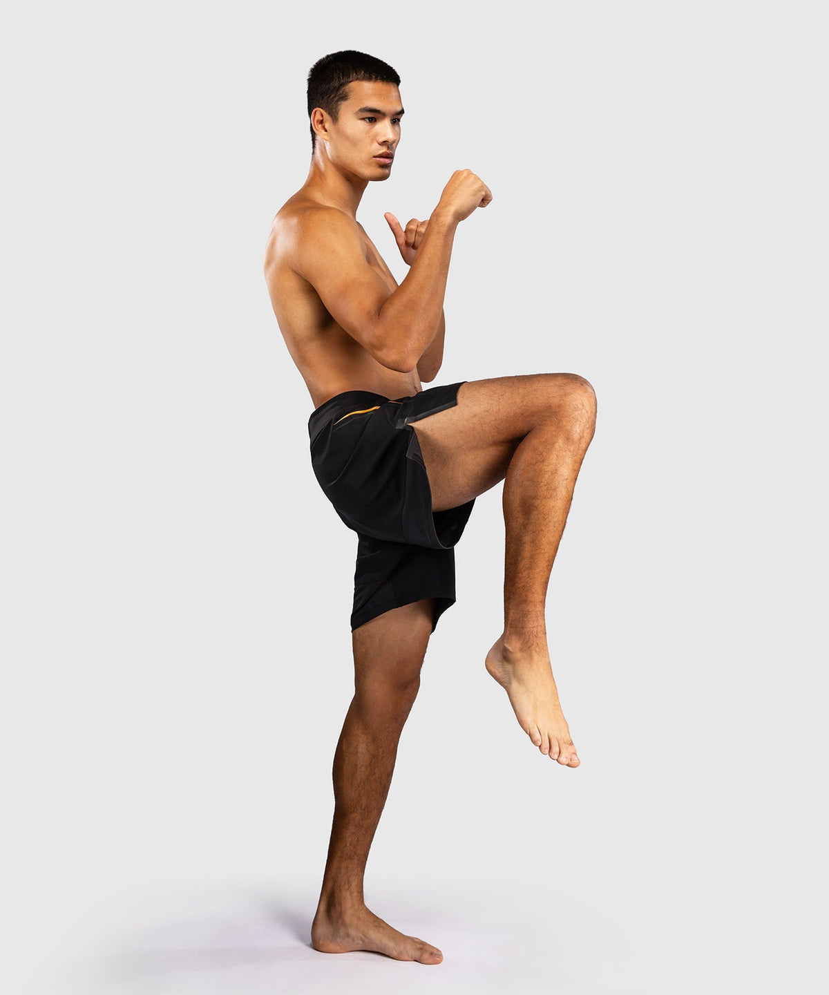 Venum MMA Shorts G-Core - Schwarz/Gold