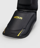 Venum Schienbeinschoner G-Core – Schwarz/Gold