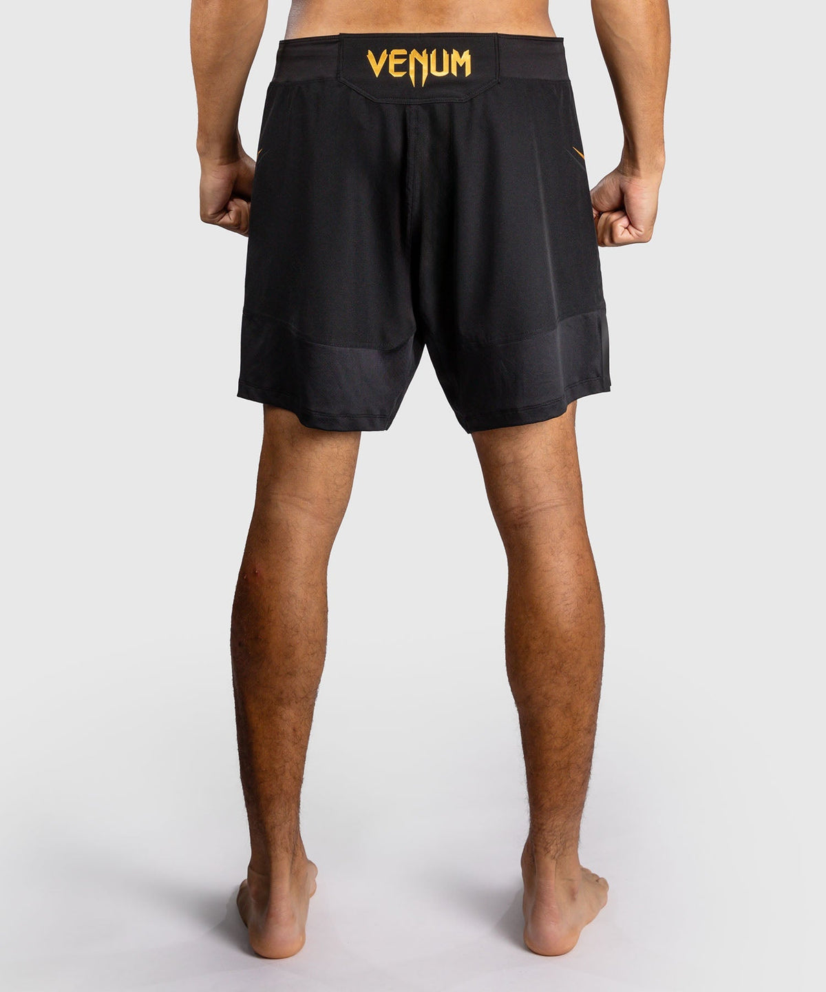 Venum MMA Shorts G-Core - Schwarz/Gold