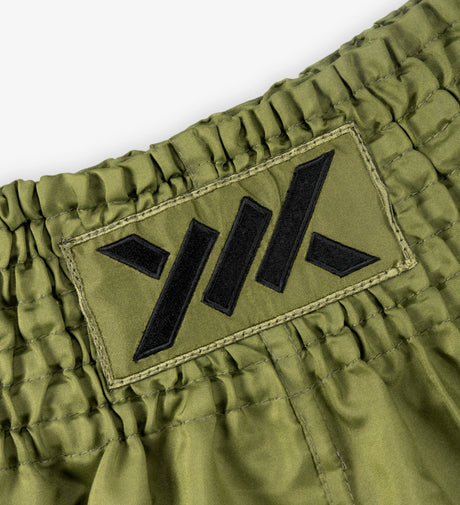 Caged Muay Thai Shorts Classic - Khaki Grün/Schwarz vrouw
