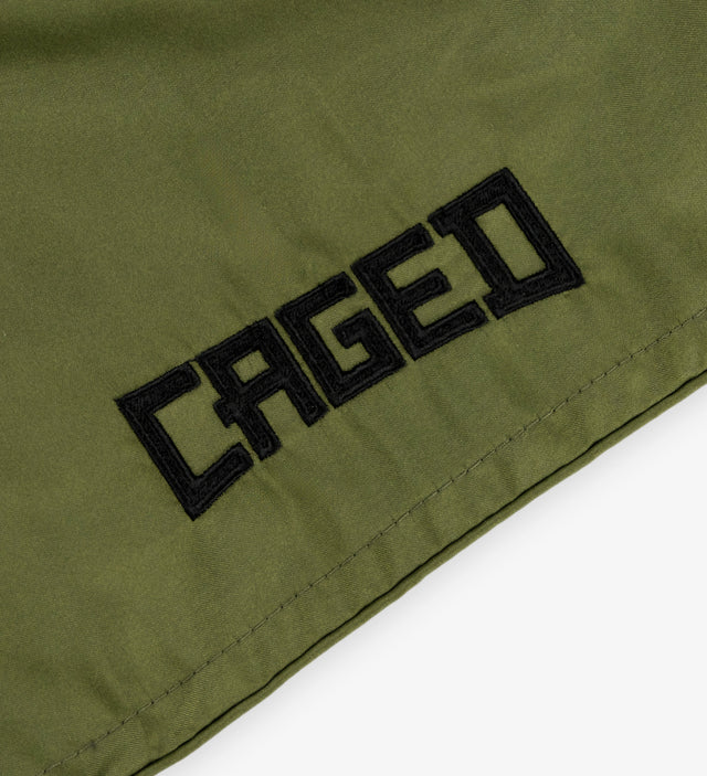 Caged Muay Thai Shorts Classic - Khaki Grün/Schwarz vrouw