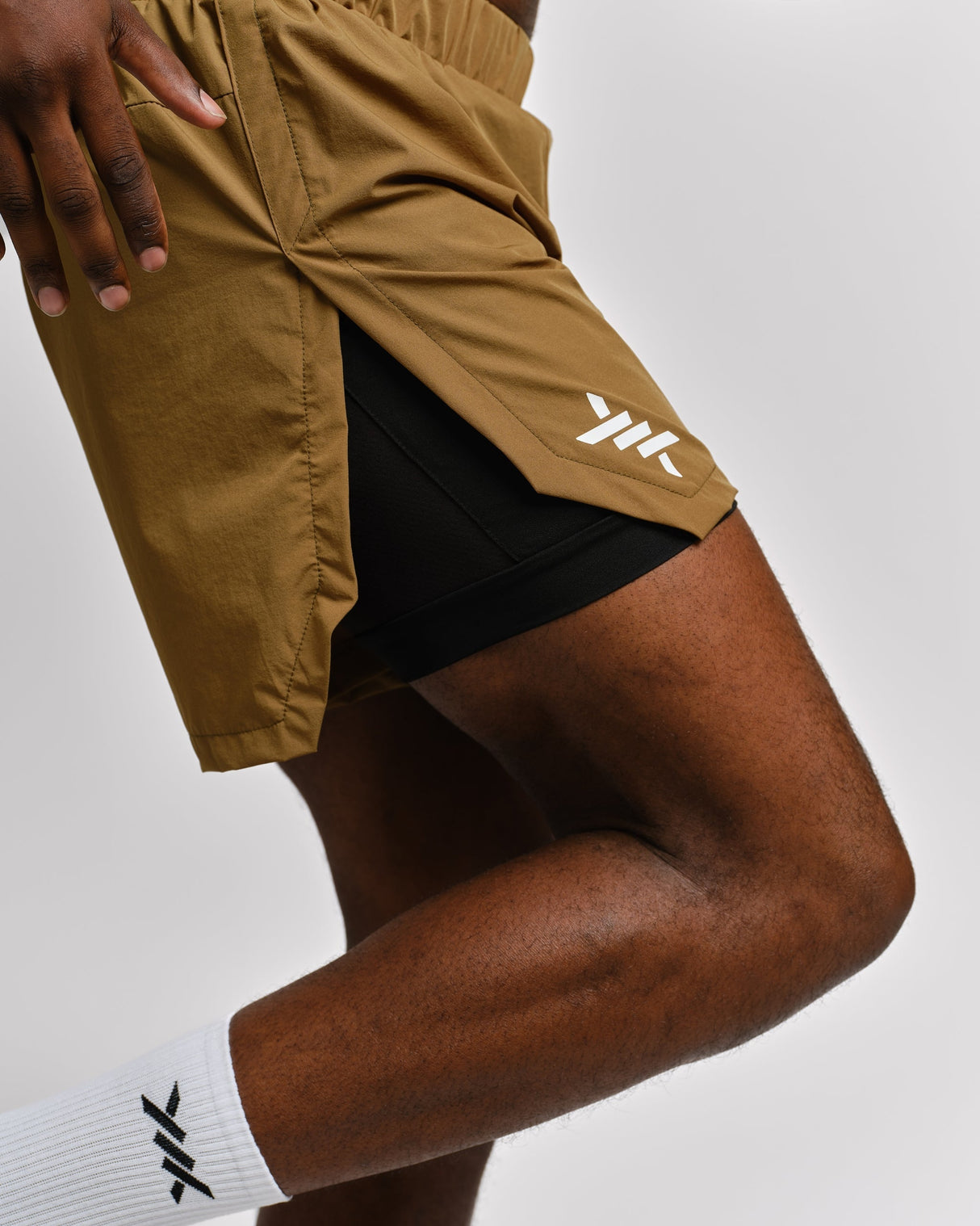 Caged 2-in-1 Running Shorts Stride – Olivgrün