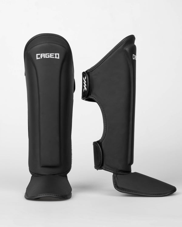 Caged Schienbeinschoner Spark Kids - Mattschwarz/Weiss