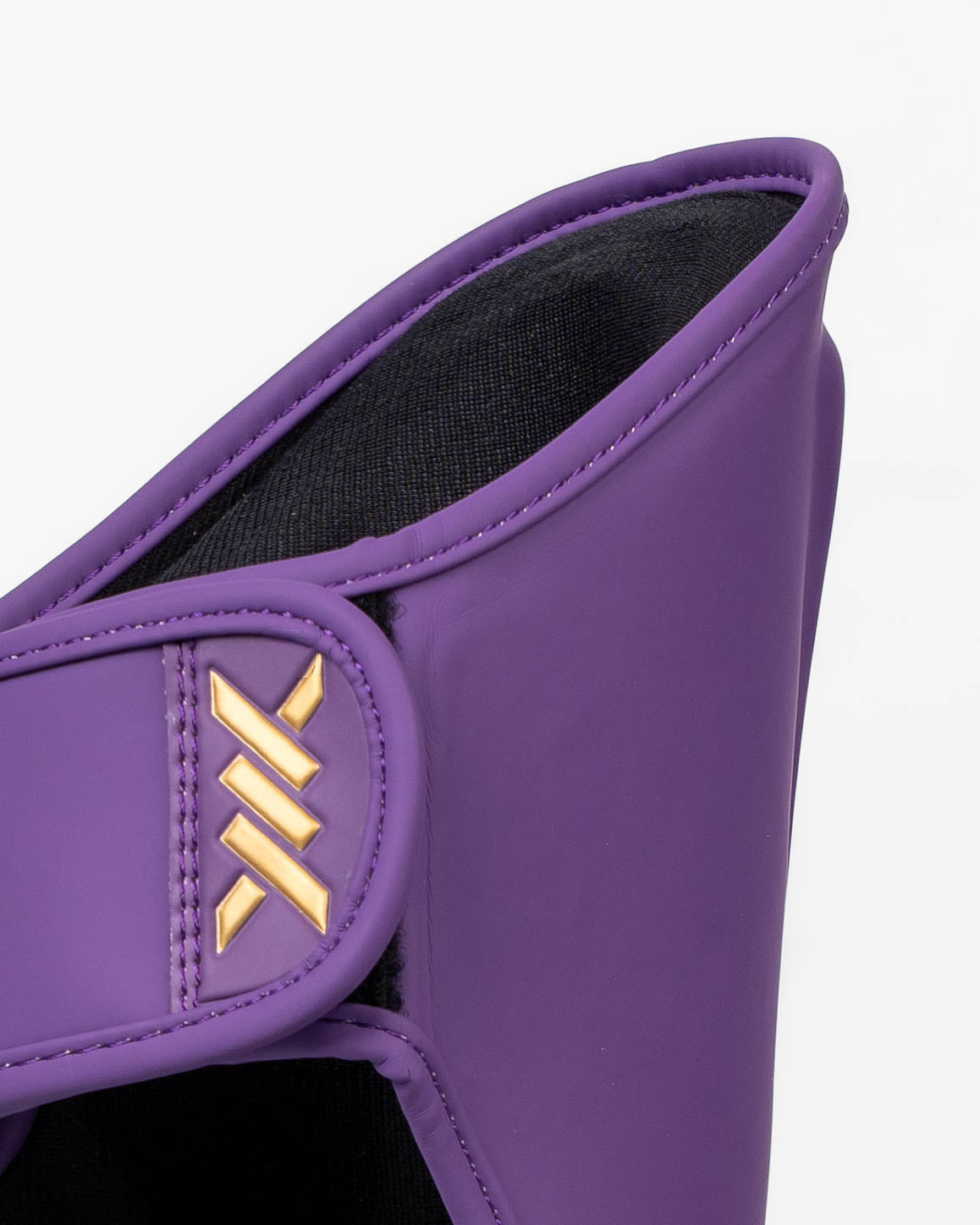 Caged Schienbeinschoner Spark Kids - Lila/Gold