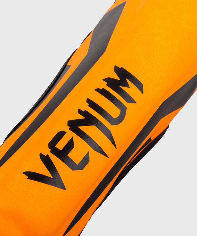 Venum Schienbeinschoner Elite Kinder – Neonorange