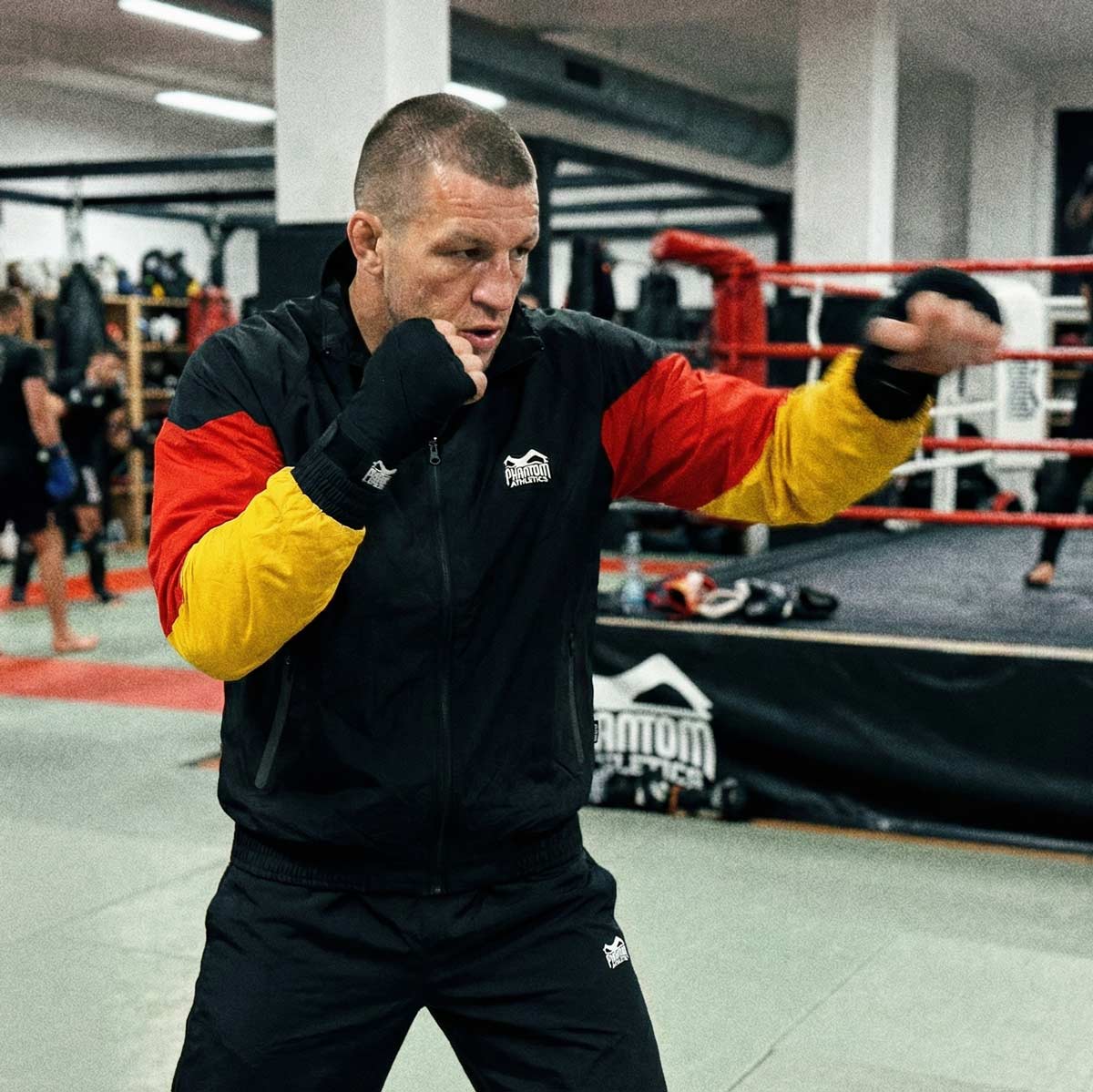 Phantom Athletics Trainingsjacke DMC Team Germany - Schwarz/Rot/Gold