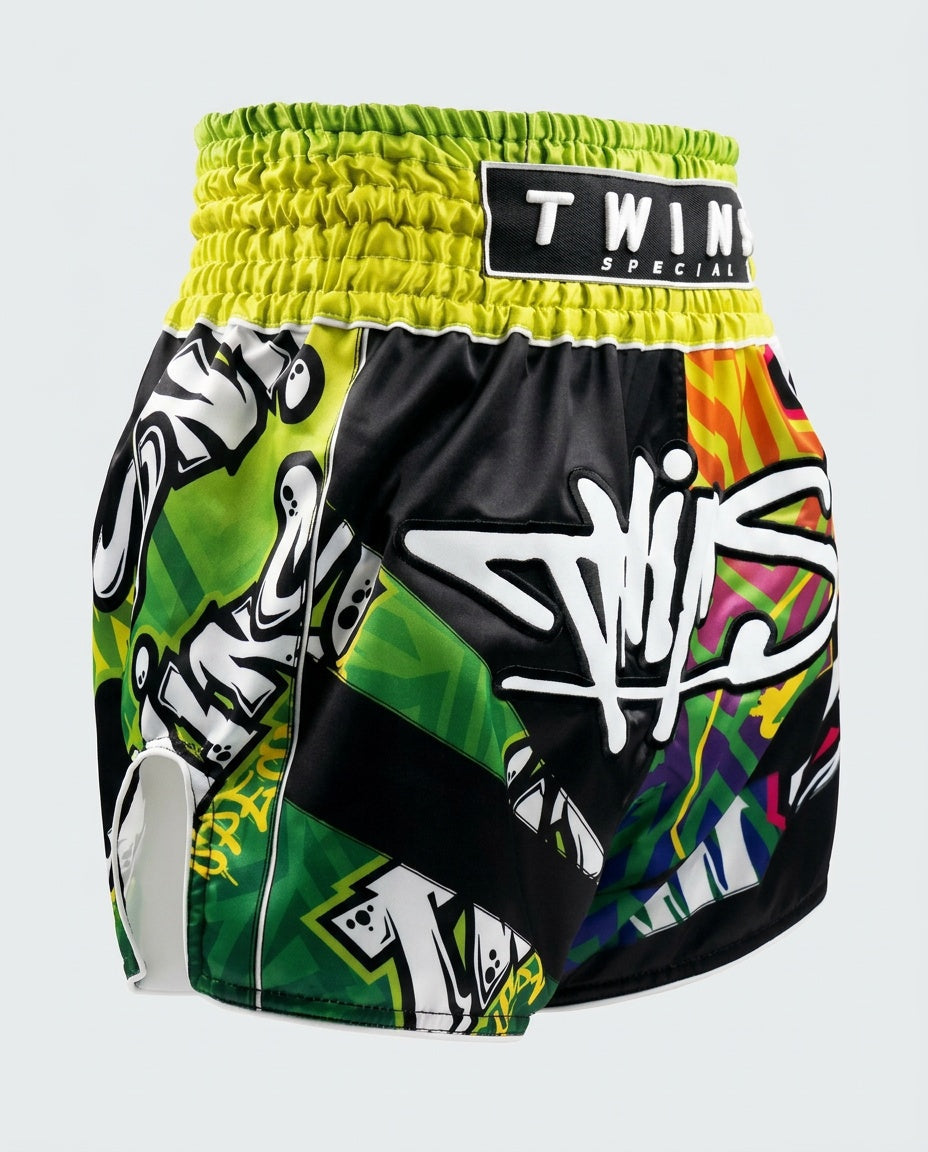 Twins Muay-Thai-Shorts TTBL Graffiti – Schwarz/Grün/Gelb