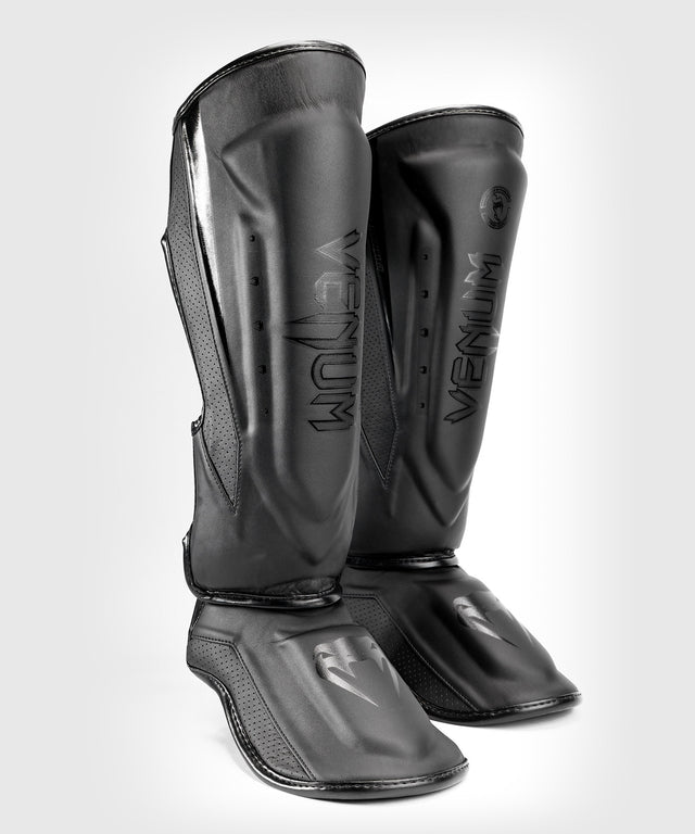 Venum Schienbeinschoner Elite Evo - Schwarz/Schwarz