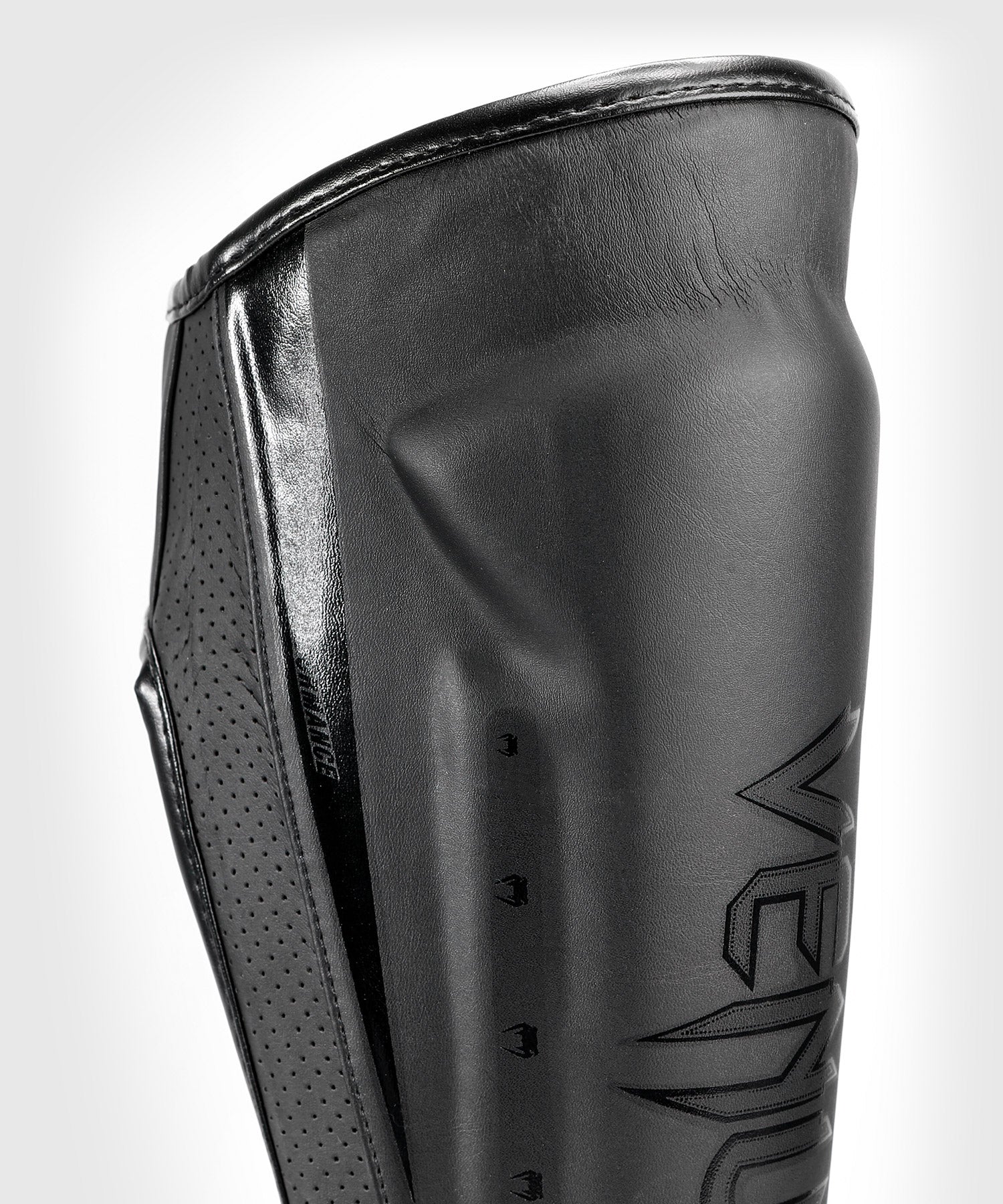 Venum Schienbeinschoner Elite Evo - Schwarz/Schwarz