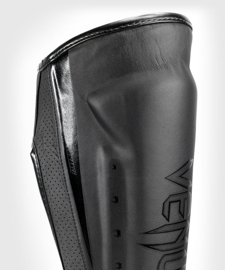 Venum Schienbeinschoner Elite Evo - Schwarz/Schwarz