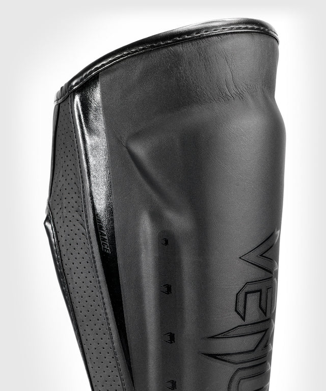 Venum Schienbeinschoner Elite Evo - Schwarz/Schwarz