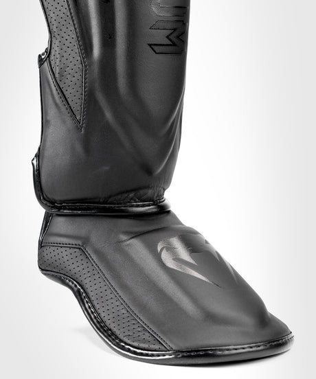 Venum Schienbeinschoner Elite Evo - Schwarz/Schwarz