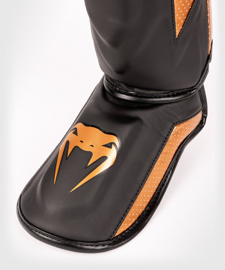 Venum Schienbeinschoner Elite Evo - Schwarz/Bronze