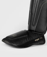 Venum Schienbeinschoner Impact Evo Scales – Schwarz