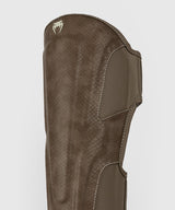 Venum Schienbeinschoner Impact Evo Scales – Braun