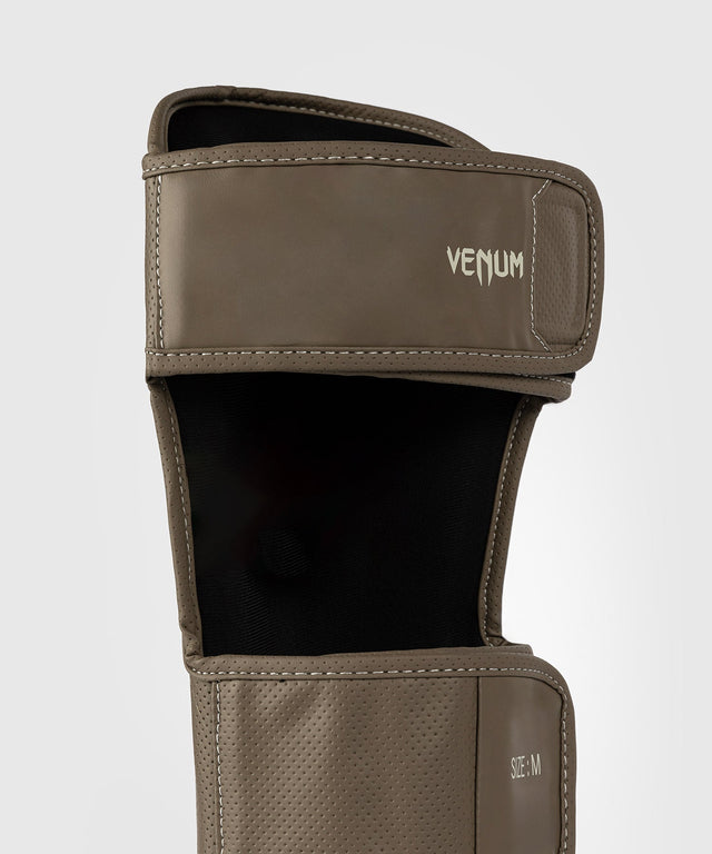 Venum Schienbeinschoner Impact Evo Scales – Braun