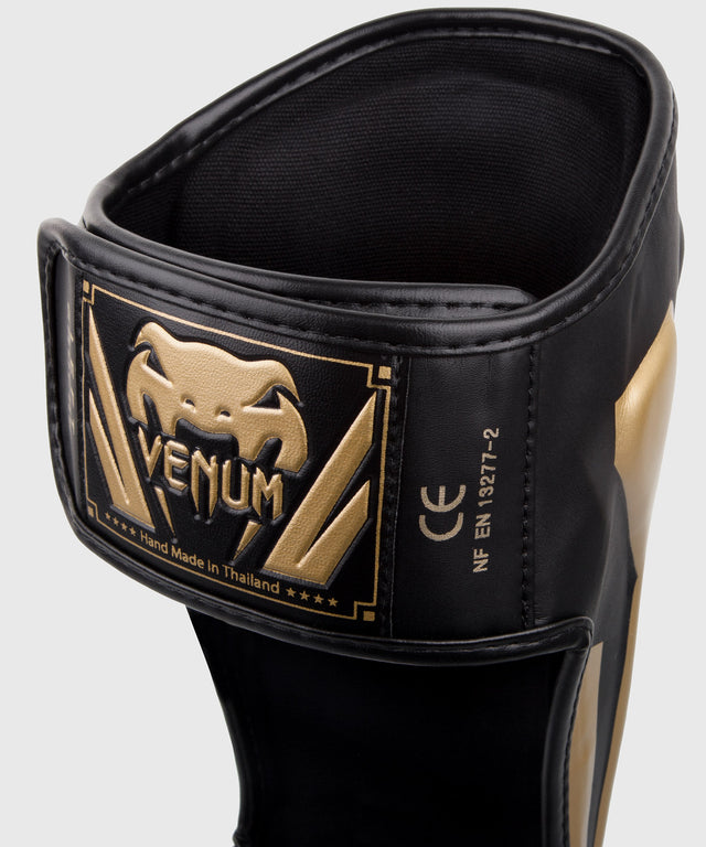 Venum Schienbeinschoner Elite - Schwarz/Gold