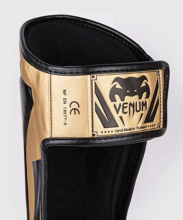 Venum Schienbeinschoner Elite - Gold/Schwarz