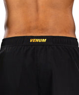 Venum Trainingsshorts G-Core – Schwarz/Gold