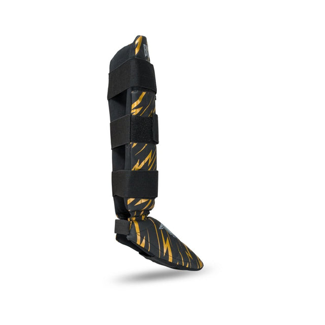 Booster Schienbeinschoner Kids Combat – Schwarz/Gelb