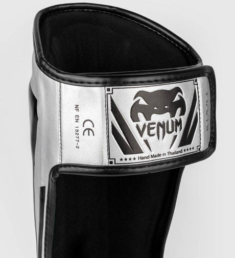 Venum Schienbeinschoner Elite - Silber/Schwarz - The Fight Company Deutschland